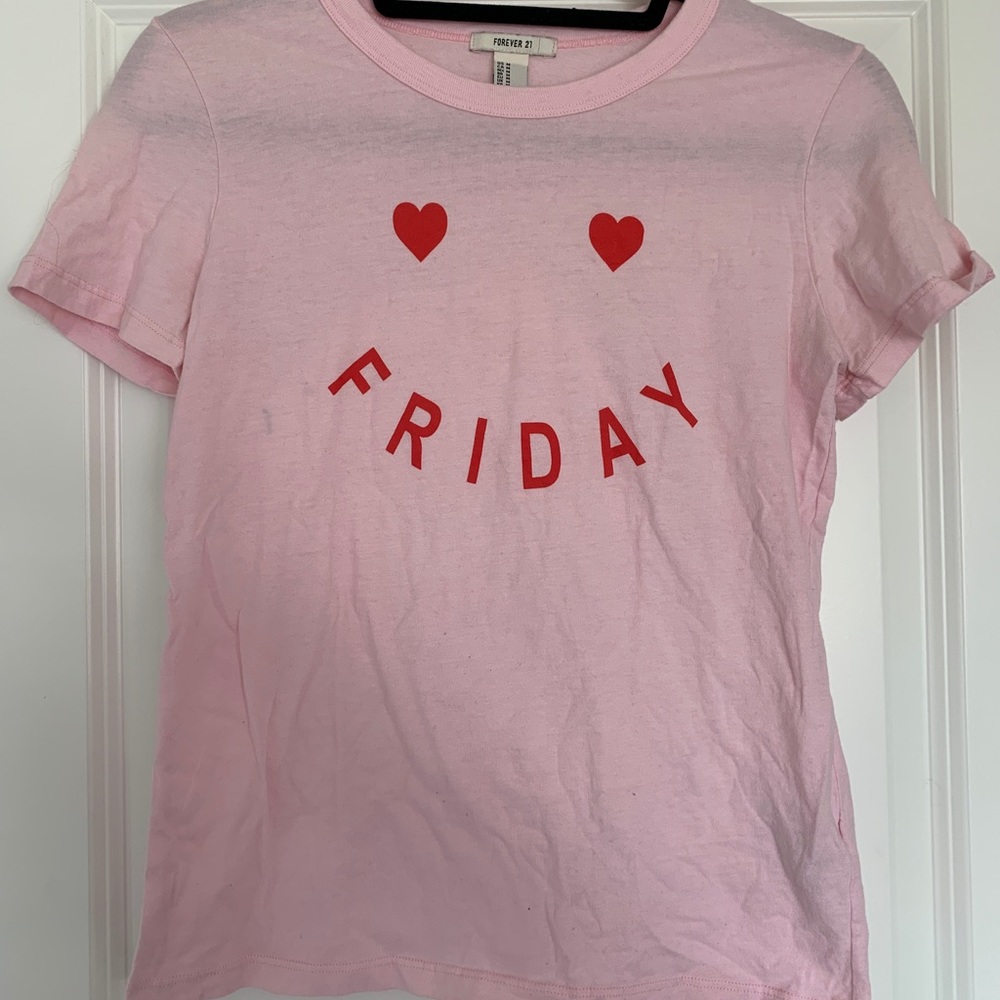 pink “Friday” shirt